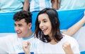 Happy soccer fans from Argentina with argentinian flag Royalty Free Stock Photo