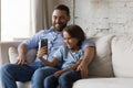 Happy son kid and cheerful dad talking on video call Royalty Free Stock Photo