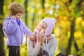 Happy son play with mother like doctor. relax in autumn forest. Spring mood. seasonal cold. Happy family day. Mother