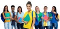 Happy south american female student with group of multi ethnic young adults Royalty Free Stock Photo