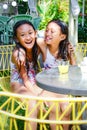 Happy Asian Siblings in Swimsuit Smiling, Laughing and Embracing Each Other Spending Time Together Outdoor