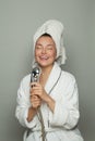 Happy spa woman taking a shower and singing portrait Royalty Free Stock Photo