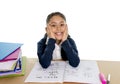Happy spanish little school girl with notepad smiling in back to school and education concept Royalty Free Stock Photo