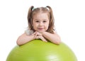 Happy sportive kid playing with fitness ball isolated on white background Royalty Free Stock Photo