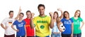 Happy sports fan from Brazil with other fans Royalty Free Stock Photo