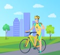 Happy Sportsman with Blue Bottle on Yellow Bike