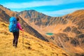 Happy sporty backpacker hiker woman in mountains, Carpathians, Transylvania, Romania Royalty Free Stock Photo