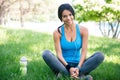 Happy sporty woman resting outdoors Royalty Free Stock Photo