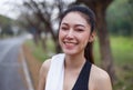 Happy sporty woman with white towel resting after workout sport Royalty Free Stock Photo