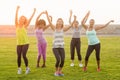 Happy sporty women dancing during fitness class