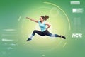 Happy sporty young woman jumping in fighting pose Royalty Free Stock Photo