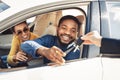 Happy Spouses Taking Key For Test Drive Sitting In Automobile