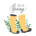 Happy spring. Rain boots with flowers and leaves. Wellies with green leaves banner isolated on white background Royalty Free Stock Photo