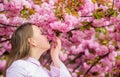 Happy spring vacation. Spring in botany garden. That is how spring smells. Tender bloom. Little girl enjoy spring. Kid Royalty Free Stock Photo