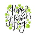 Happy St. Partick`s day greeting. Calligraphy design for cards. Typography on white background with green four-leaf Royalty Free Stock Photo