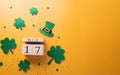 Happy St Patrick\'s Day decoration concept made from shamrocks ( clover leaf), wooden calendar and leprechaun hat