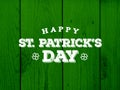 Happy St. Patrick`s Day Text Over Green Wood Background