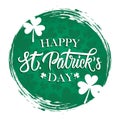 Happy St. Patrick`s Day greeting card with hand lettering, clovers on green circle brush stroke background. Royalty Free Stock Photo