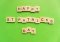 Happy St. Patrick`s Day Poster. Word block on green paper background.