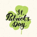 Happy St Patrick`s Day Vintage greeting card Hand lettering on clover silhouette, Irish holiday grunge textured retro design vecto Royalty Free Stock Photo