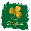 Happy St. Patrick\'s Day wish - golden leaf and inscription on grungy green background