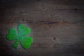 Shamrocks on vintage style wood background. St.Patrick`s day holiday symbol. Top view, copy space