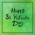 Happy St. Patricks. Hand drawn lettering. Green blurred background is decorated with four leaf clovers
