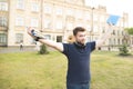 Happy student with books and a notebook in the hands of a university campus Royalty Free Stock Photo