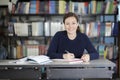 Happy student doing homework Royalty Free Stock Photo