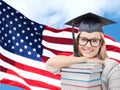 Happy student girl with books over american flag Royalty Free Stock Photo