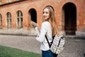 Happy student girl with school bag and notebooks outdoors Royalty Free Stock Photo