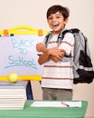 Happy student in his classroom Royalty Free Stock Photo