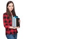 Happy student life. Attractive cheerful young female student holding books, isolated on white