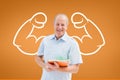 Happy student man with fists graphic standing against orange background