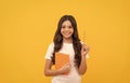 happy student prepare for exam. schoolgirl do homework. school report. pupil hold planner. Royalty Free Stock Photo