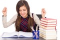 Happy student sitting at desk, hands in the air Royalty Free Stock Photo