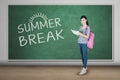 Happy student with tablet and summer break word Royalty Free Stock Photo