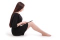 Happy student teenage girl sitting on the floor with tablet pc Royalty Free Stock Photo