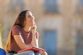 Happy student thinking looking at side in a campus Royalty Free Stock Photo