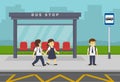 Happy students going to school. Kids waiting for transit on a city bus stop. Royalty Free Stock Photo