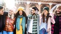 Happy students group walking at european city on sunny day - Next gen life style concept with multiracial young people Royalty Free Stock Photo