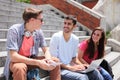 Happy students using digital tablet Royalty Free Stock Photo