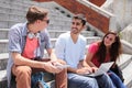 Happy students using digital tablet Royalty Free Stock Photo