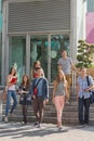 Happy students walking and smliling outside Royalty Free Stock Photo