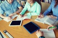 Happy students writing to notebooks in library Royalty Free Stock Photo