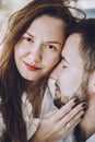 Happy stylish couple in love hugging and kissing in summer park Royalty Free Stock Photo