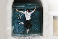 Happy stylish hipster woman jumping and having fun