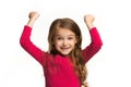 Happy success teen girl celebrating being a winner. Dynamic energetic image of female model Royalty Free Stock Photo