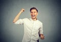 Happy successful business man winning fists pumped celebrating success Royalty Free Stock Photo