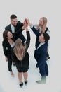 Successful business team giving a high fives gesture as they lau Royalty Free Stock Photo